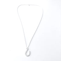 Thumbnail for Collar corto con una herradura y cadena de plata de ley. La herradura contiene circonitas para que brilles como te gusta.